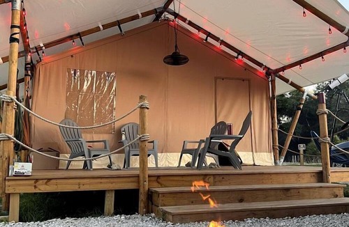 Okeechobee RV Rental | Double Deluxe Safari Tent with Fire Pit and Hammocks in Basinger, Florida