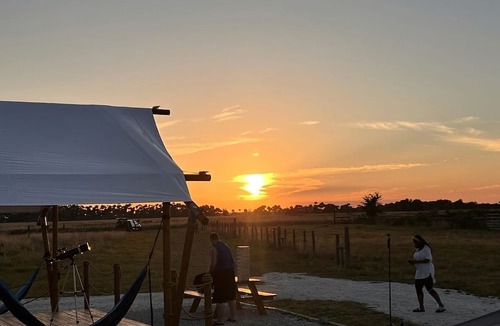 Okeechobee RV Rental | Double Deluxe Safari Tent with Fire Pit and Hammocks in Basinger, Florida