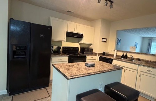 Lithonia House | East Atlanta, Three Bedroom, Three Story Townhome Retreat.