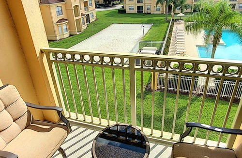 Loughman Condo | Elegant Condo w/Pool View Balcony Resort Pool & Gym. Near Disney/Shops