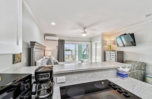 Bay Esplanade Apartment | Enchanted Inn Suite #2 w/View of the Intra-costal water-way Pool, Fishing Dock,