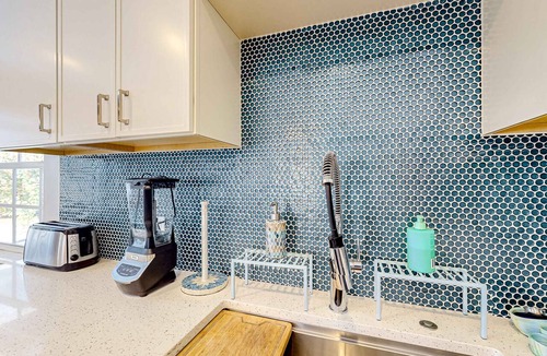 Isles of Capri House | Enchanting dog-friendly beach bungalow with patio, fireplace, deck, AC, & W/D