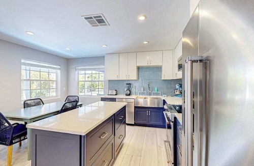 Isles of Capri House | Enchanting dog-friendly beach bungalow with patio, fireplace, deck, AC, & W/D