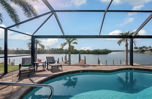 Pelican House | Enjoy the view to the nature reserve from your private pool & spa at Villa Amara