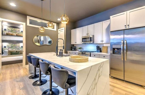 Katie Hill Neighborhood House | Expansive 4BR/5BA DT Home with Hot Tub & Game Room