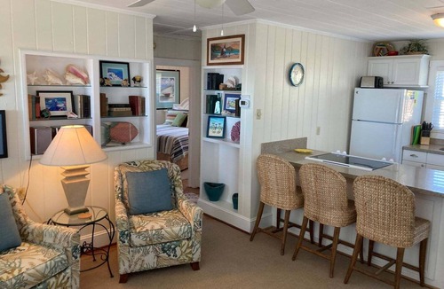 Holden Beach House | Experience bliss at Coast 'N Along, a spacious 3-bedroom retreat in Holden Beach.