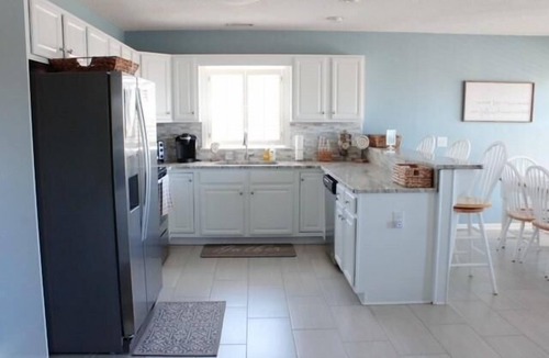 Holden Beach House | Experience coastal bliss at Reel Blessed, a spacious 4-bedroom haven in Holden Beach.
