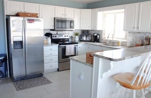 Holden Beach House | Experience coastal bliss at Reel Blessed, a spacious 4-bedroom haven in Holden Beach.