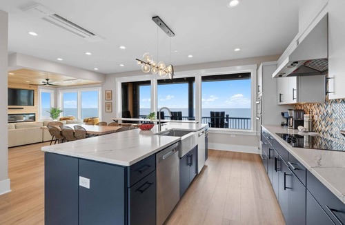 Oak Island House | Experience luxury at the Black Pearl, an oceanfront home in Oak Island with 11 bedrooms.