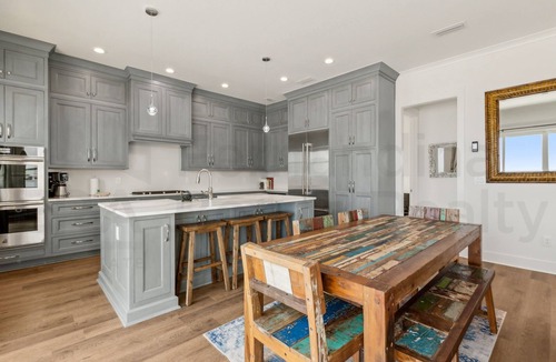 Ocean Cay House | Experience oceanfront luxury at 1088 S. Fletcher Ave, a spacious 5-bedroom house