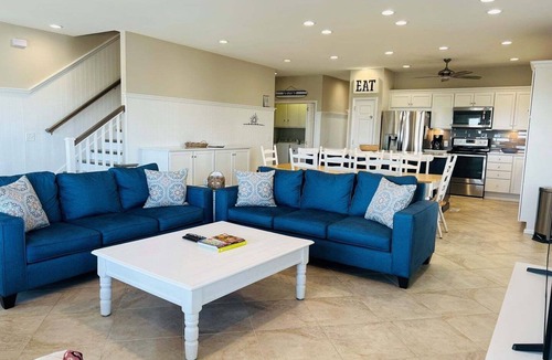 Holden Beach House | Experience oceanfront luxury at FINS, a spacious 10-bedroom retreat in Holden Beach.