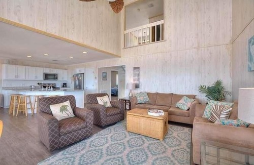Long Beach Hotel | Experience oceanfront bliss at Therapy, a spacious 5BR house in Oak Island.