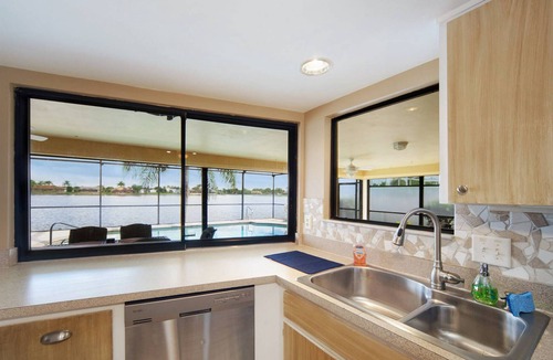 Fort Myers Villa | Exquisite Lakeview Oasis: Charming 3 bd, 2 bath vacation rental with heated pool