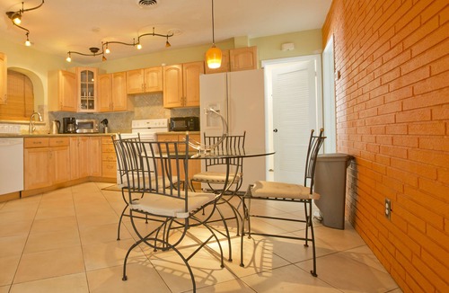 Garden Isles House | Family Waterfront Retreat – Private Pool, Hot Tub, Walk to Beach!