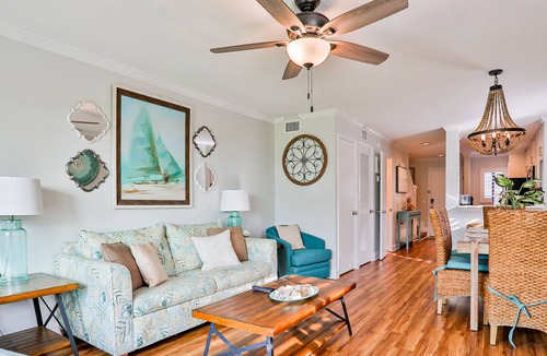 Crescent Beach Condo | Fantastic coastal gem with shared pools, private balcony, beach access & WiFi