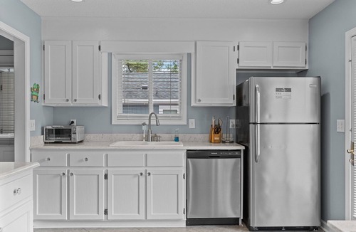 Tranquil Harbour House | Fenced in yard, Short walk to the beach from this spacious home. Dogs welcome!