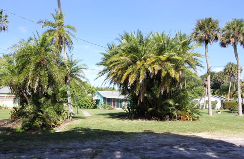St. Lucie Village Cottage | Fishing Cottage With 250 ft dock and boat slip 2 miles to the Atlantic Ocean