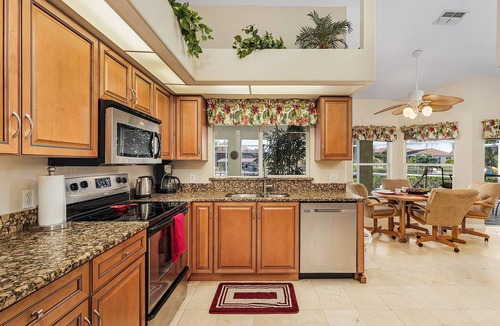 Burnt Store Villa | Fun for the Whole Family! Pool Table, Heated Pool, Fishing Dock -Villa Serendipity-Roelens Vacations