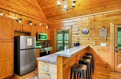 Sevierville Cabin | Great Cabin sleeps 8, New Furnishings, Loft w/Arcade Games, Hot Tub & Fireplace