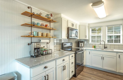 Alligator Point House | Great sunrise view from dining area and decks. Easy beach access.