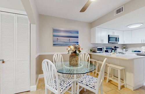 Cape Caneveral Beach Gardens Condo | Ground Floor Condo with Shared Heated Pool, High-Speed WiFi, and Central AC!