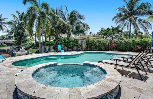Garden Isles Villa | Heated Jacuzzi &Pool~Waterfront Villa By Beach