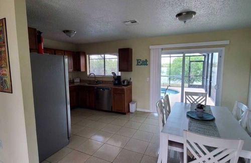Port Charlotte House | House with solar heated pool and lake view!