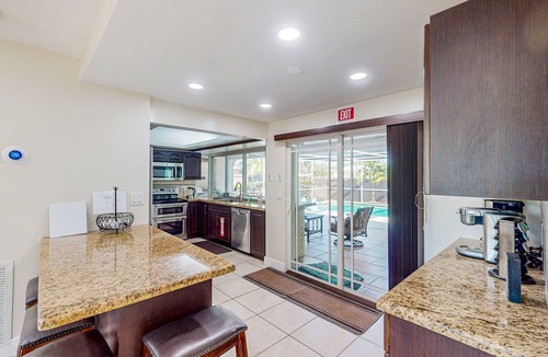 Hollywood Hills House | Ideally located home with enclosed pool, grill, W/D, & AC - snowbird-friendly