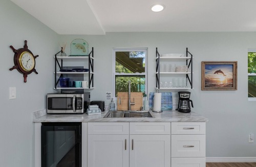 Grant-Valkaria House | Island waterfront getaway with sunset views from hot tub and boaters paradise!