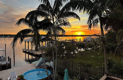 Grant-Valkaria House | Island waterfront getaway with sunset views from hot tub and boaters paradise!