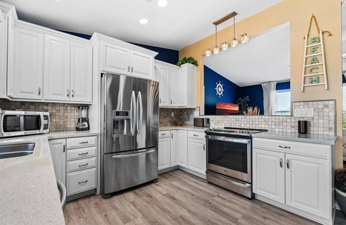 Ormond-by-the-Sea House | King Suite, Hot Tub, Pool, BBQ Grill, Bikes, Patio, EV Charger, 600 ft 2 Beach!