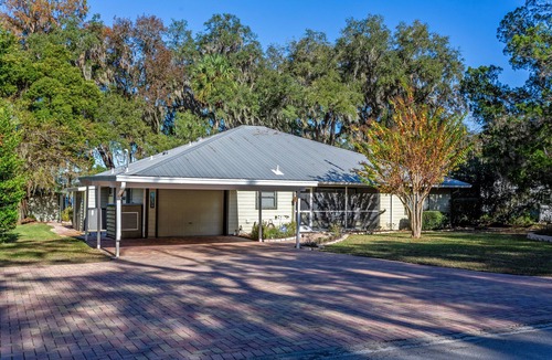 Citrus Springs House | Lakefront Getaway! Relax Spa Dock Kayaks Firepit Handicap Friendly