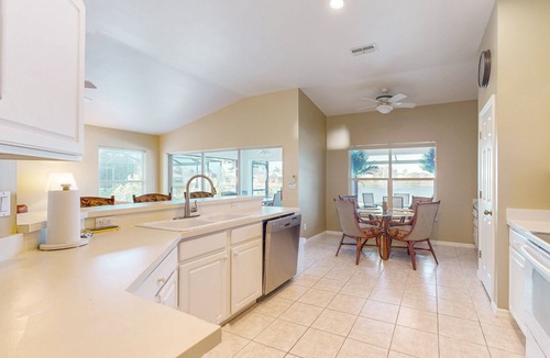 Beachwalk Isles House | Lakefront home with private heated outdoor pool, enclosed lanai, & central AC