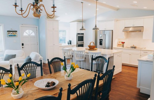 Lake Placid House | Lakefront Home with Chefs Kitchen, Dock, Water Trampoline, Grill & Game Room