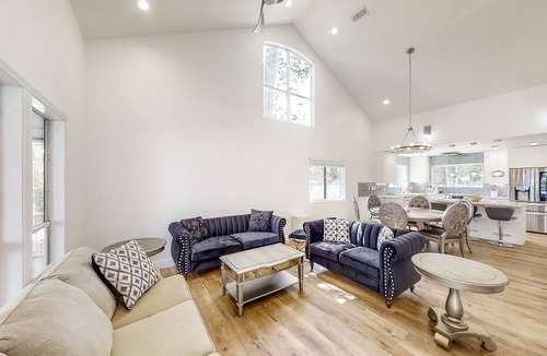 Telogia House | Lakefront stunner with large screened-in porch