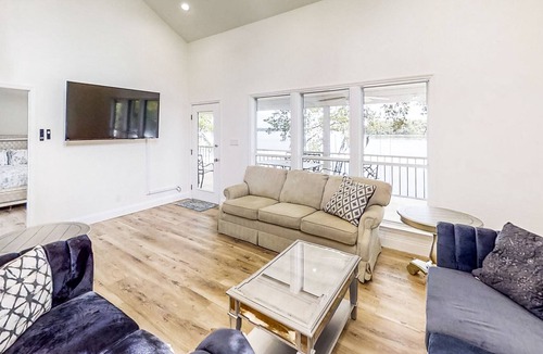 Telogia House | Lakefront stunner with large screened-in porch