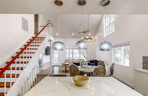Telogia House | Lakefront stunner with large screened-in porch