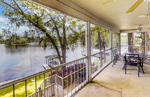 Telogia House | Lakefront stunner with large screened-in porch