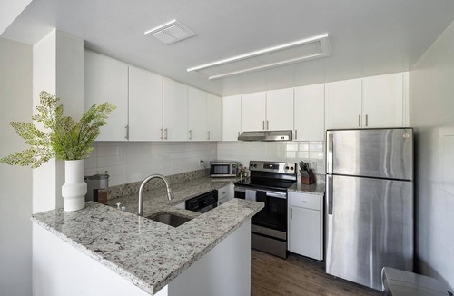 Interchange Square Apartment | Landing | Chic 1BD, Tennis Court, Gym