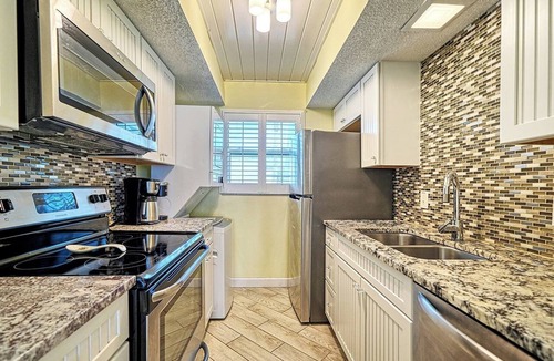 Longboat Key Apartment | LaPlaya 105B-Relax on the balcony and watch the dolphins swim by!