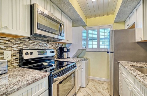 Longboat Key Apartment | LaPlaya 105B-Relax on the balcony and watch the dolphins swim by!