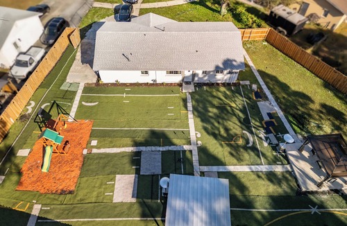Fort Pierce North House | Located in tranquil Ft Pierce with game room, gazebo, outside bar, & playground.