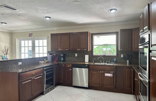 Highland Garden Villa | Luxury 5 Bedroom Art Villa, Heated Pool, Hot tub, Billiards, Grill!