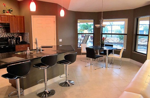 Fort Myers House | Luxury, Award-Winning Pool, All-Day Sun, Dock, Tiki Hut, Wheelchair Accessible