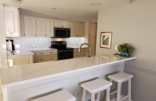 Isla del Sol Condo | LUXURY BAHIA POINTE WATERFRONT Condo/Panoramic Views! Dolphins, Manatee, More!