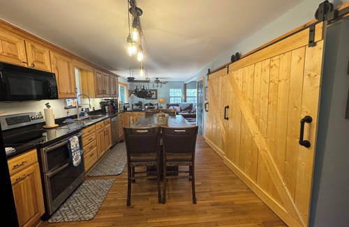 Tellico Plains Cabin | Luxury Bohemian Cabin on Coker Creek w Oversized Hot Tub, Fire-pits and Hiking