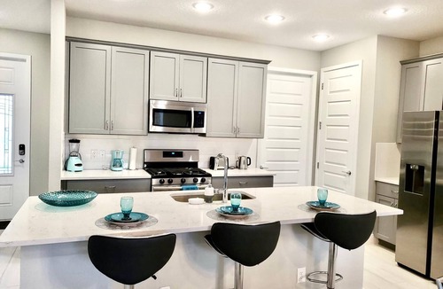 Reunion House | LUXURY Modern Reunion Resort Home . Golf Course Views, Pool Access, near Disney!