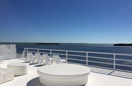 Cutthroat Harbor Estates House | Luxury * Panoramic Oceanfront Views * Boat Dock * Heated Pool