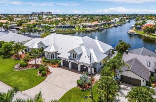 Pelican House | Luxury Resort-Style Saltwater Pool Home in SW Cape Coral