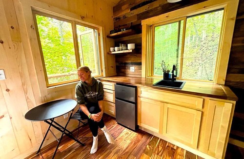 Zirconia Cabin | Magical Treehouse Stay with Creekside Sauna Experience in Zirconia, North Carolina